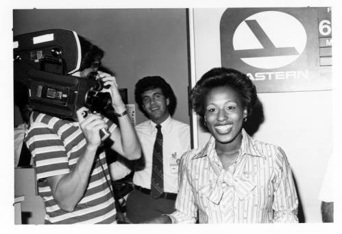 Eastern employees modeling various flight attendant uniforms from throughout Eastern's history at 50th anniversary celebration, 1978