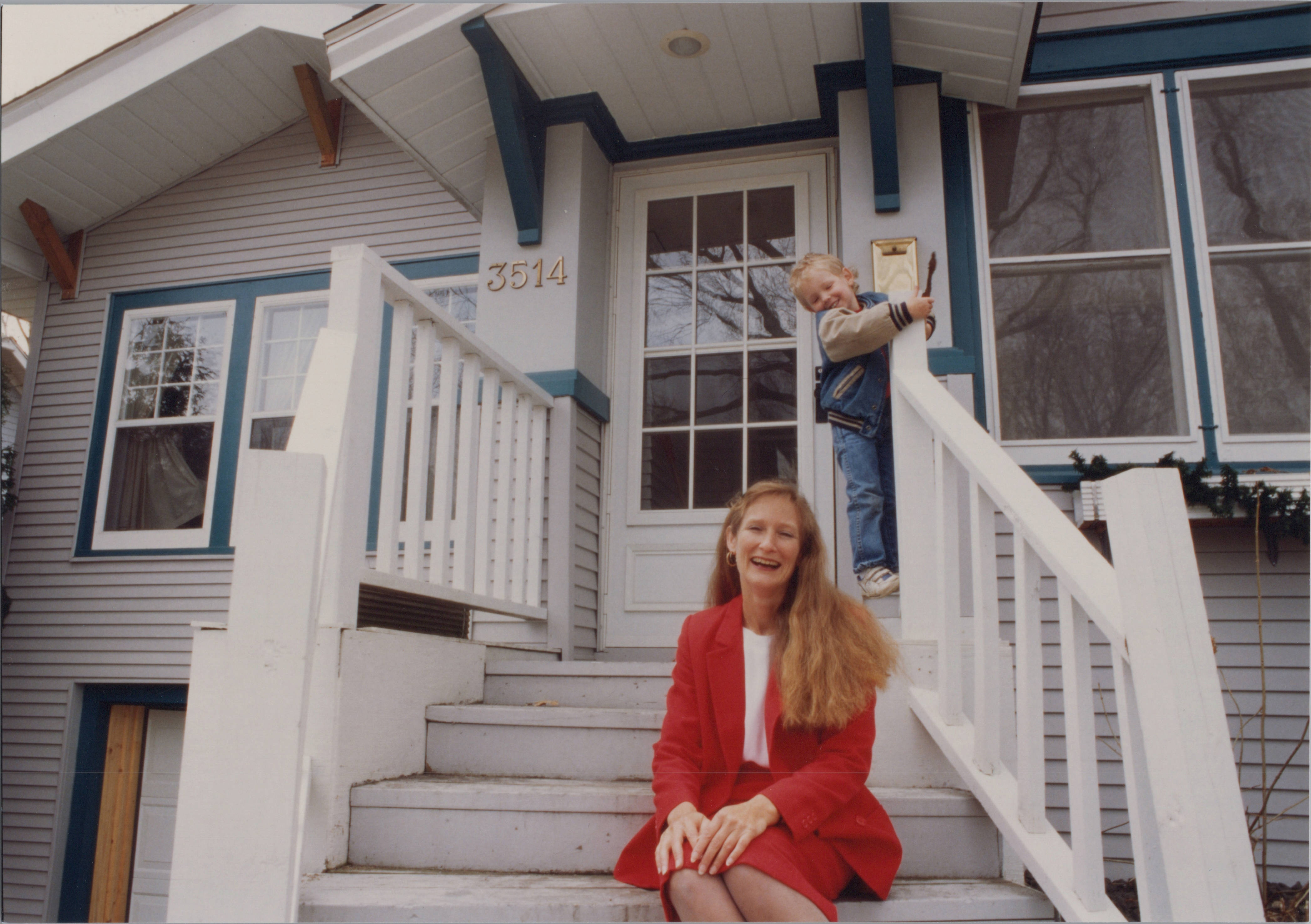 Woman and Son at Their House