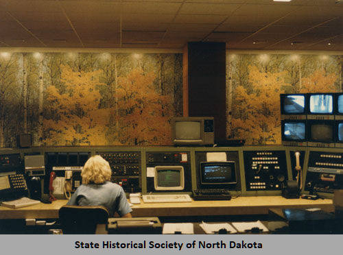 Woman at state radio command control center, Bismarck, N.D