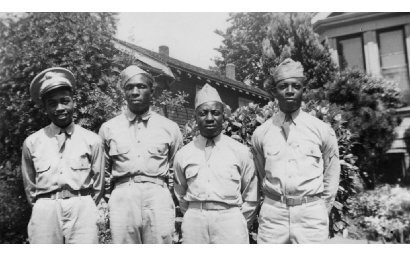 A photograph of four African American World War II draftees, 1944. 